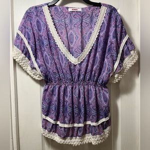 Purple batwing sleeve blouse with paisley design and crochet detail